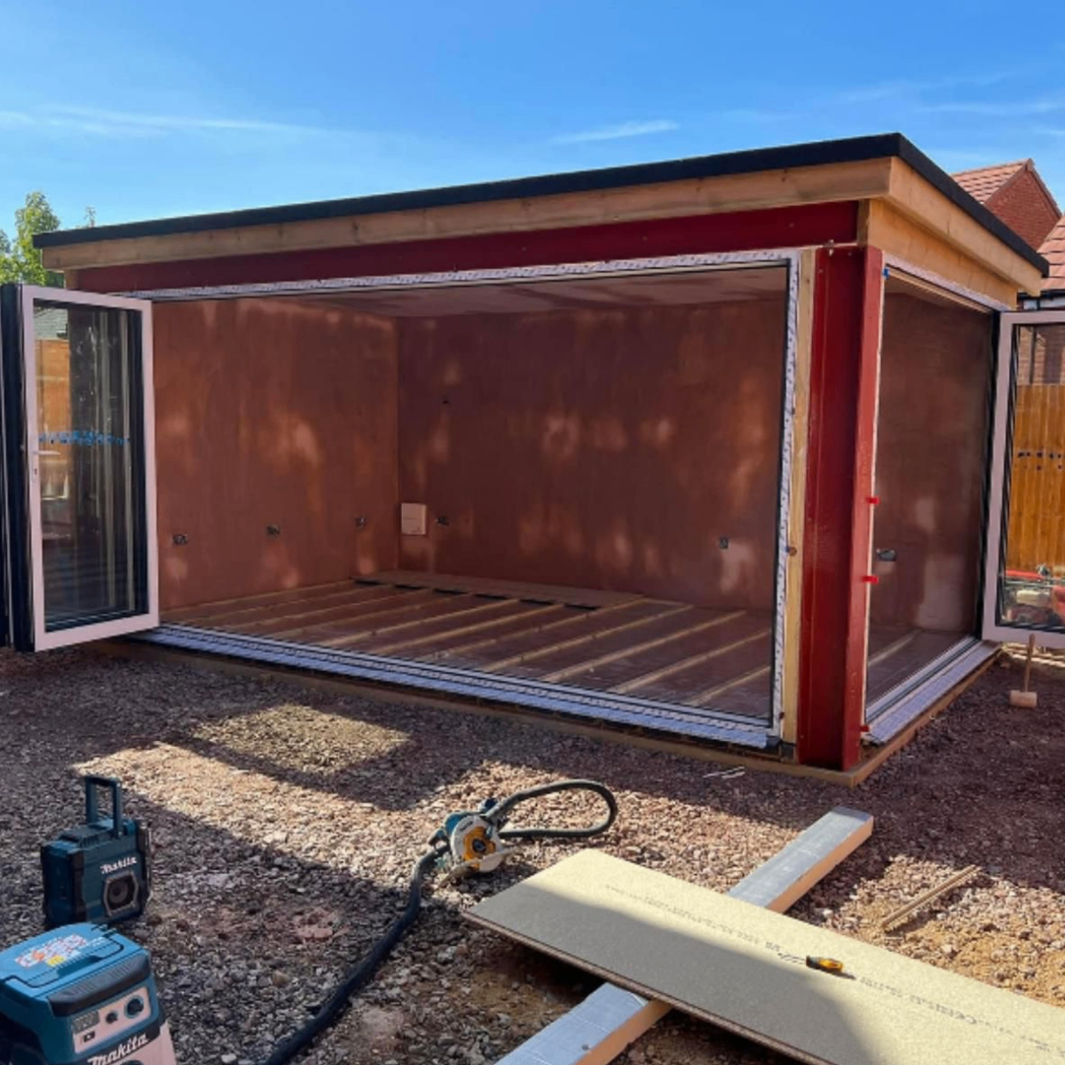 Garden room mid-build showing frame and cladding